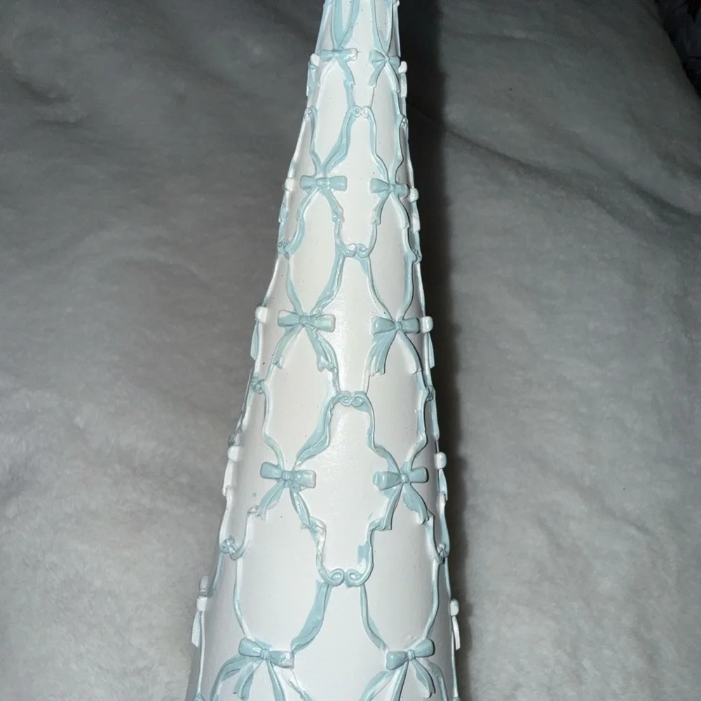 Cupcakes and cashmere Christmas Tree w blue bows across white cone & gold base
